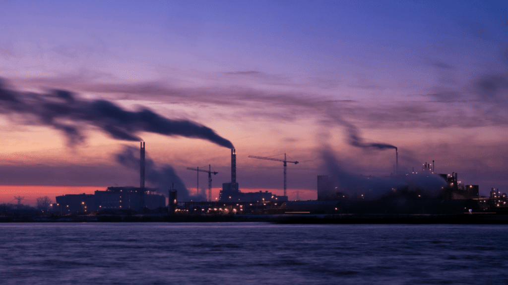 landscape view at night with manufactories in the background in an article about manufacturing reshoring